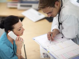 doctor speaking with reception